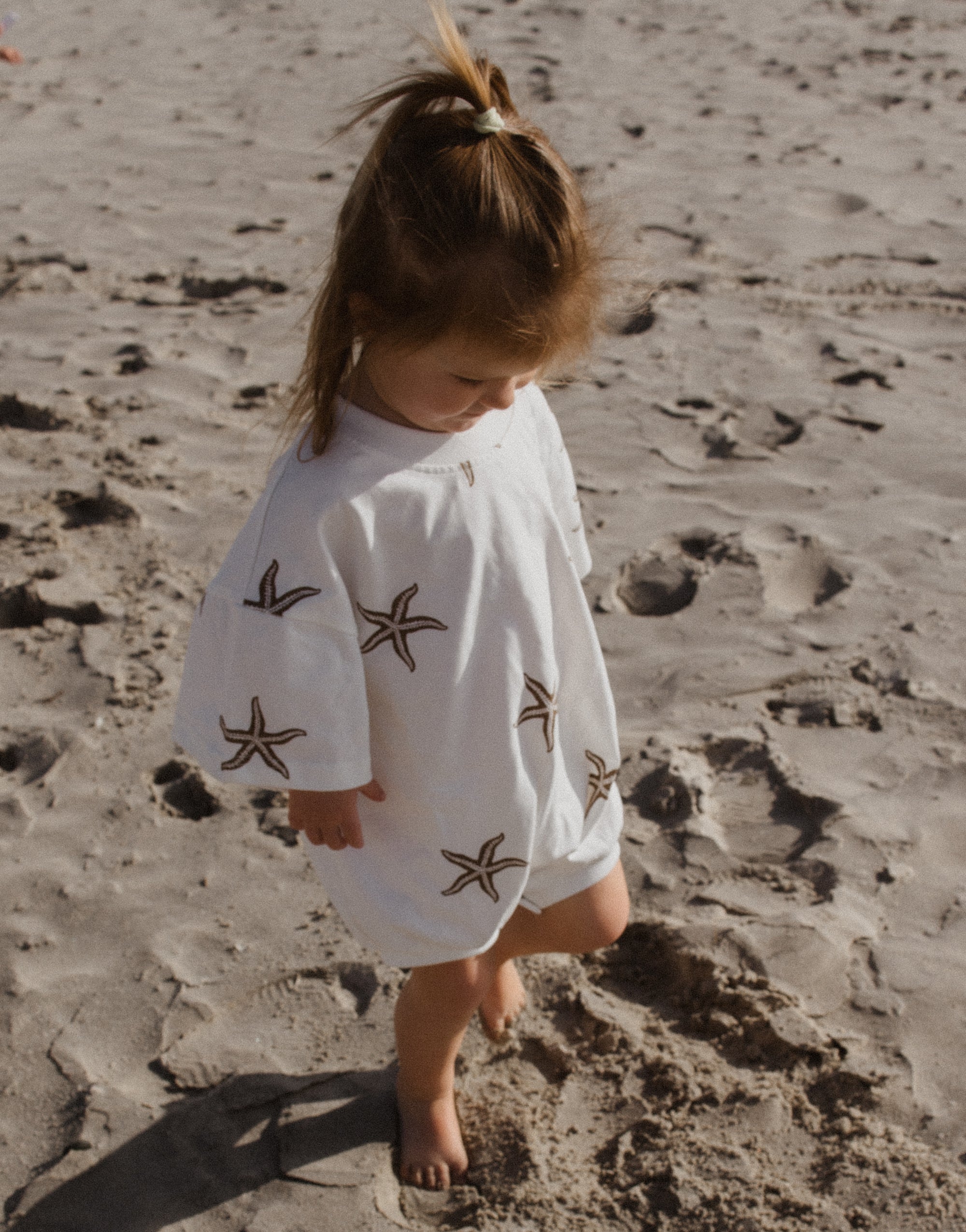 OVERSIZED TEE ROMPER - CHOC STAR