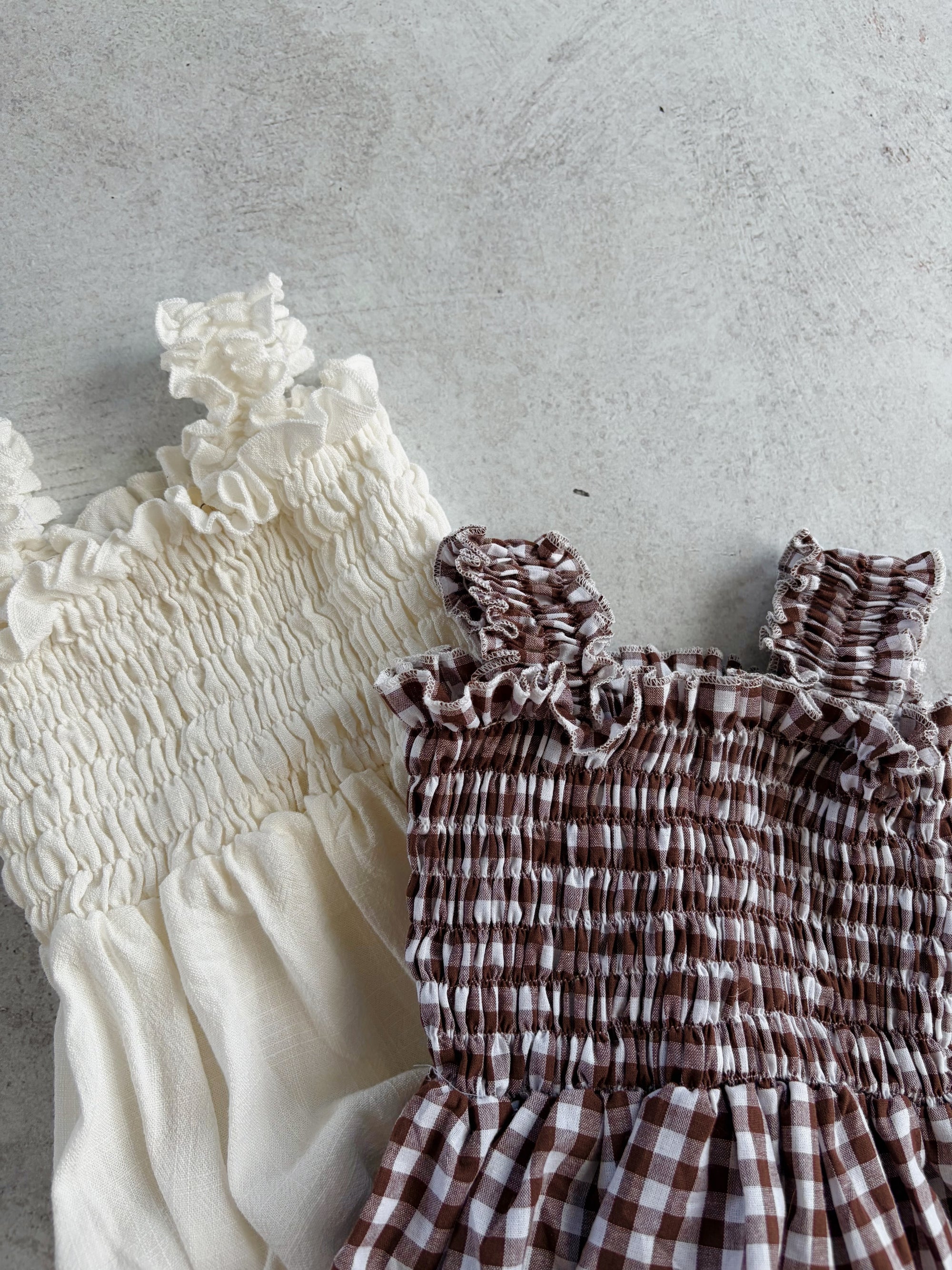 RUFFLE ROMPER - MILK